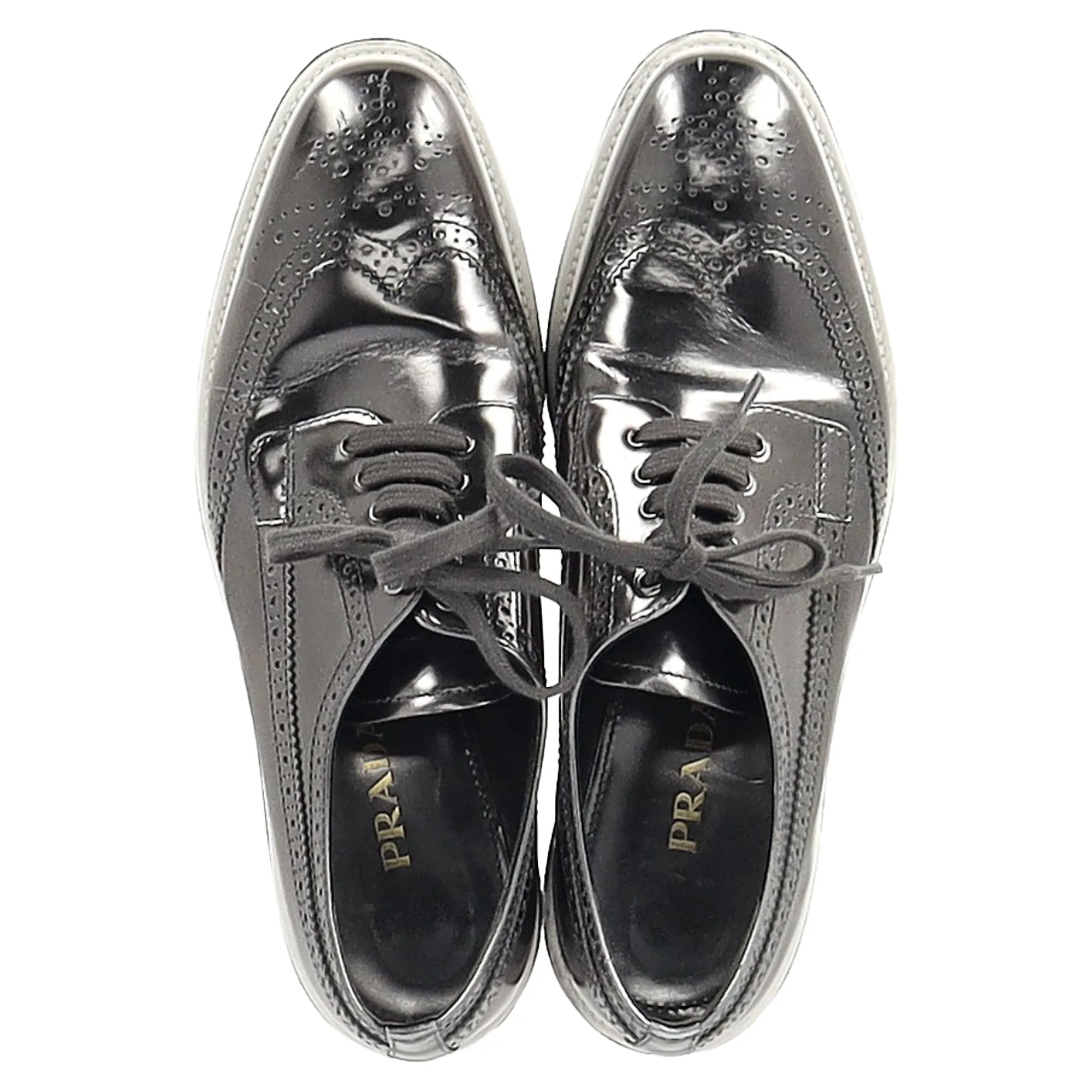 Prada Metallic Brogue Platform Low Top Sneakers in Silver Leather