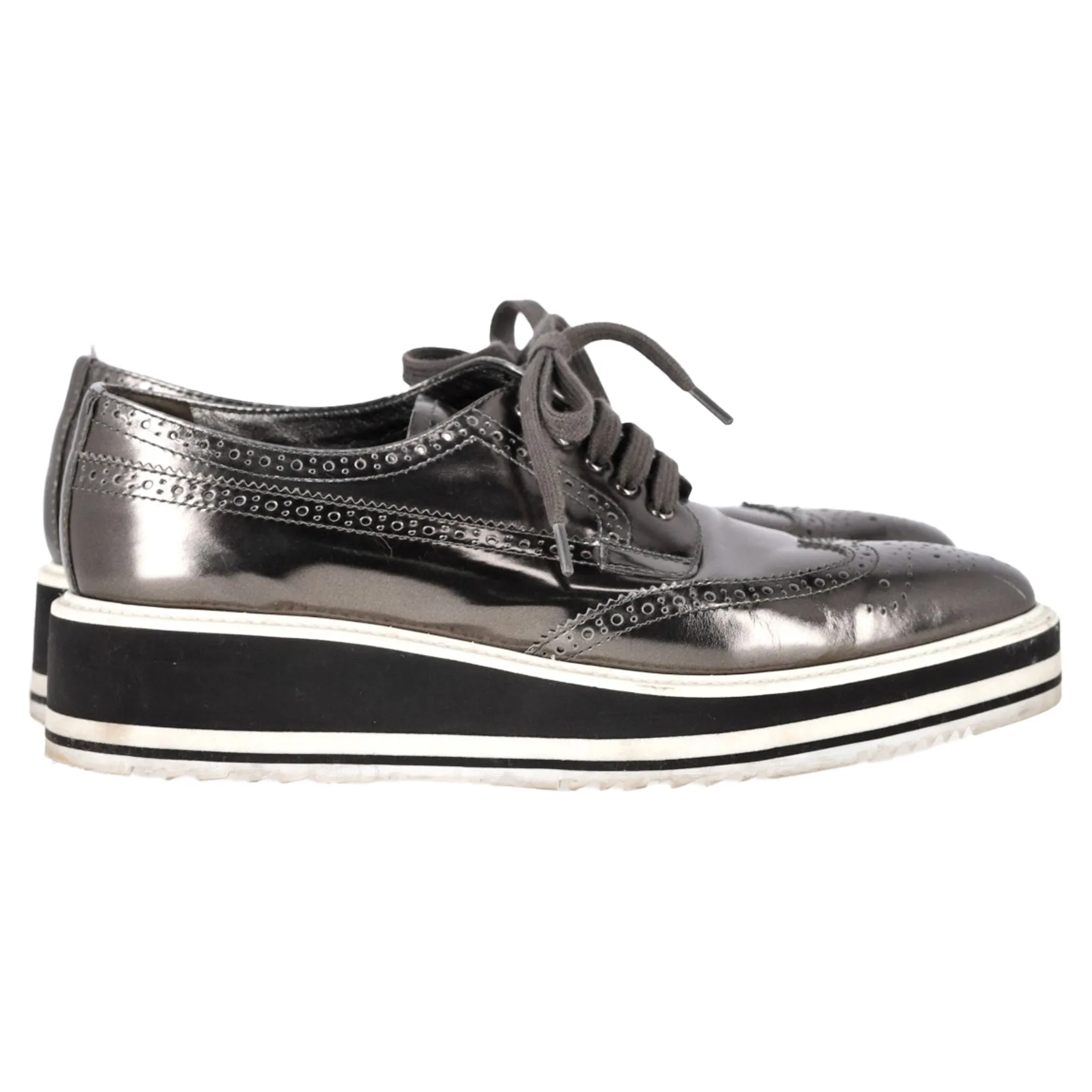 Prada Metallic Brogue Platform Low Top Sneakers in Silver Leather