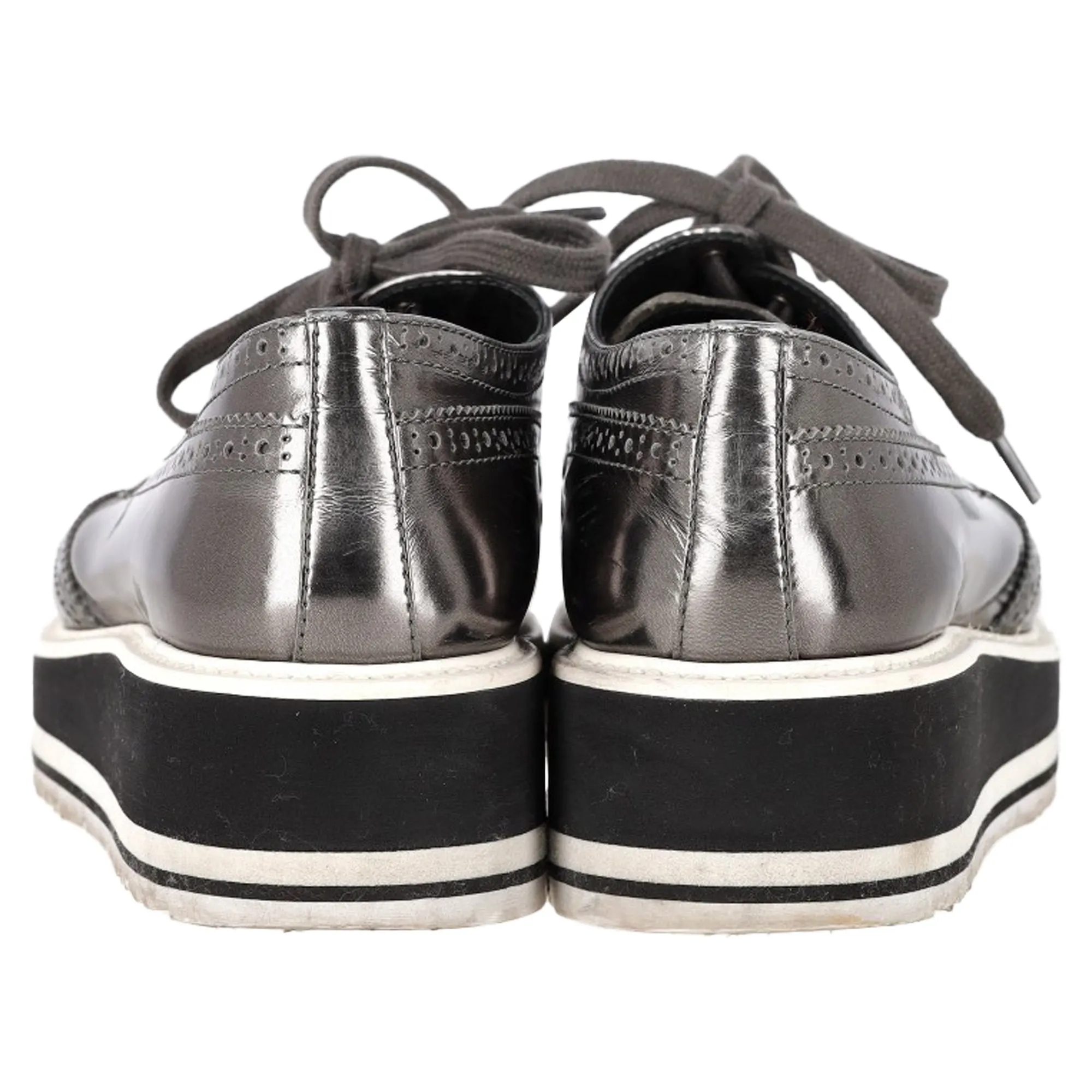 Prada Metallic Brogue Platform Low Top Sneakers in Silver Leather