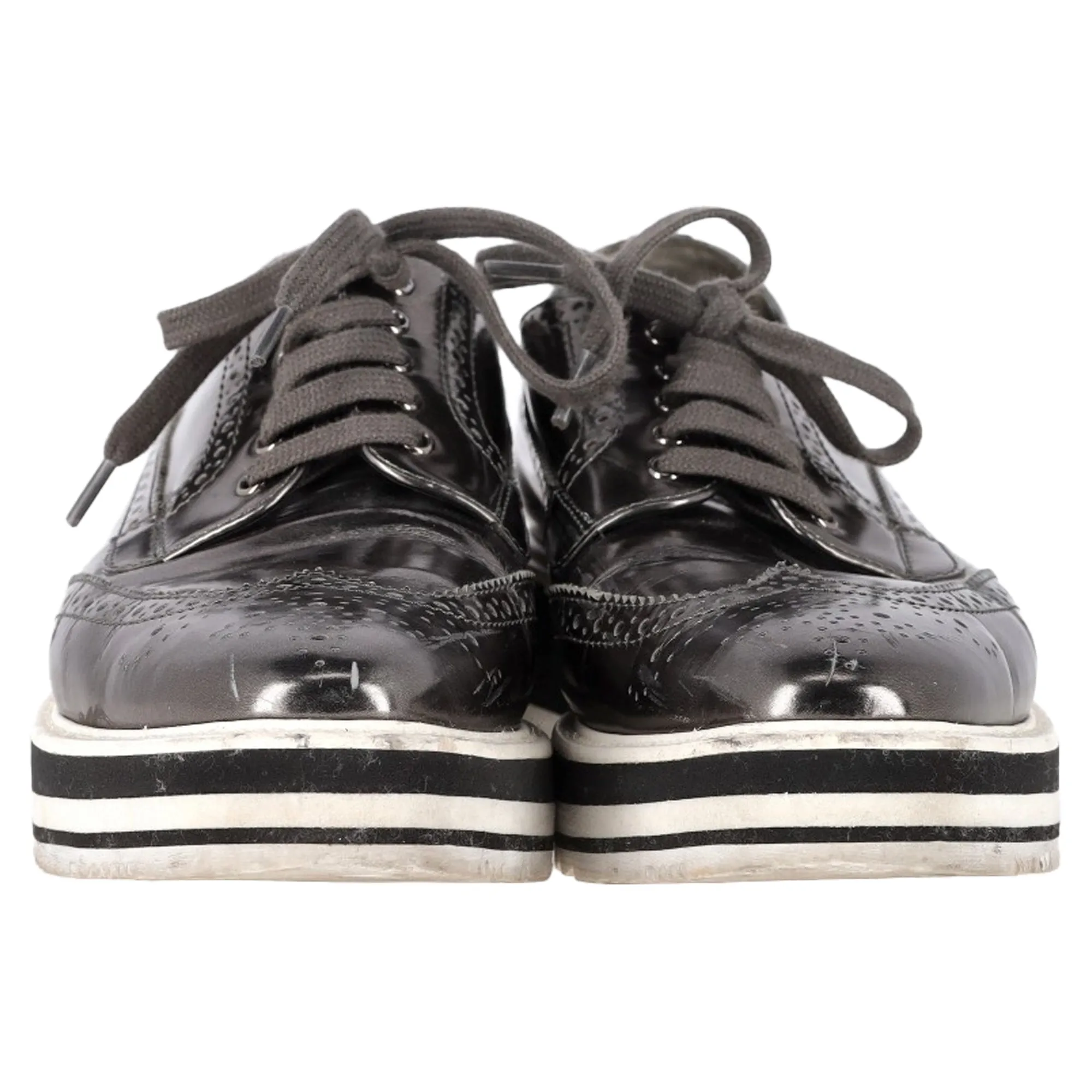 Prada Metallic Brogue Platform Low Top Sneakers in Silver Leather